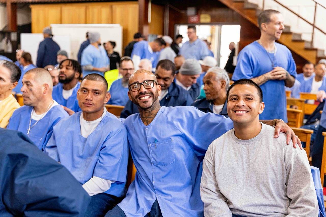 Group of men gathered in the chapel at Folsom
